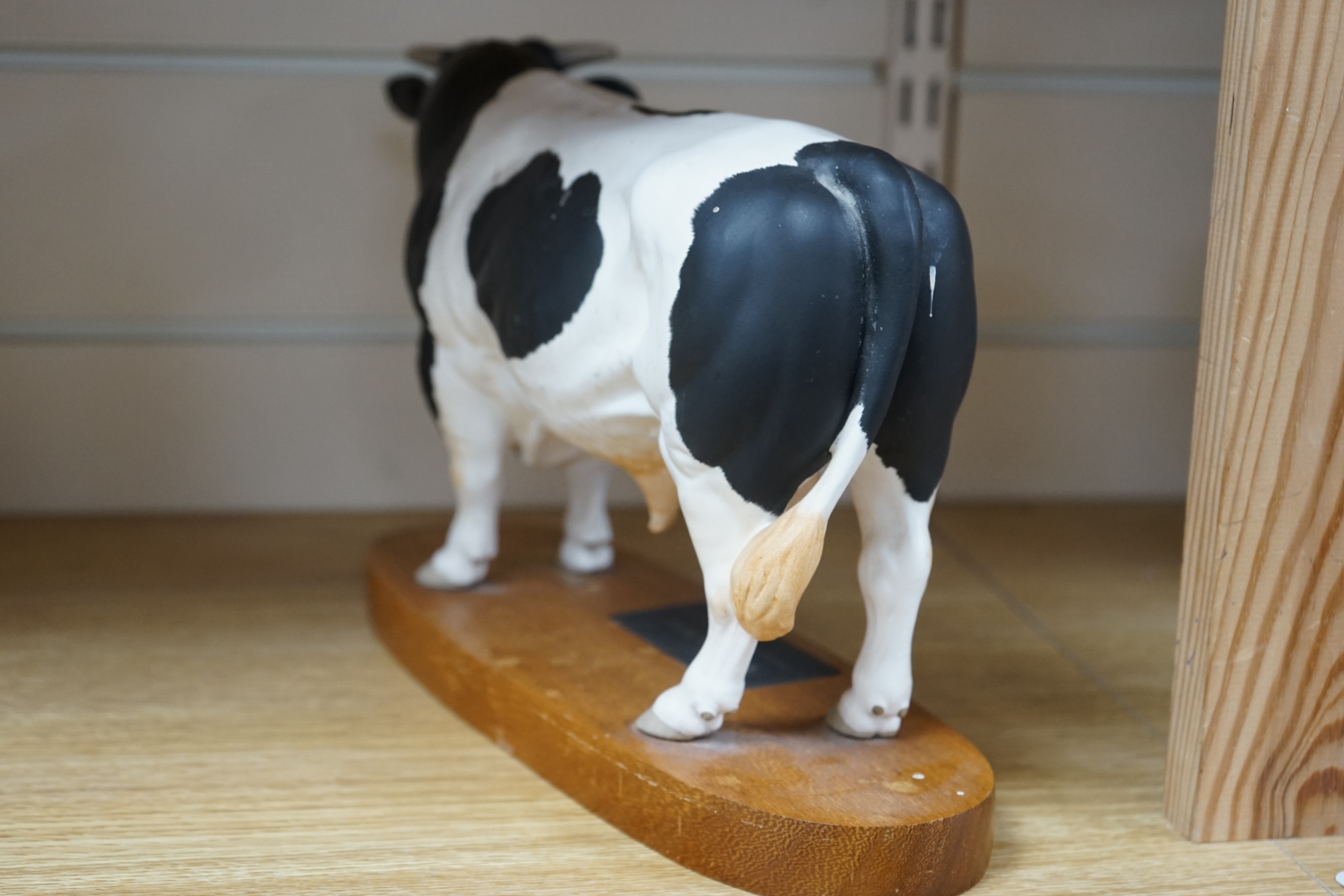 A Beswick ‘Fresian bull’, 29cm wide. Conditon - good